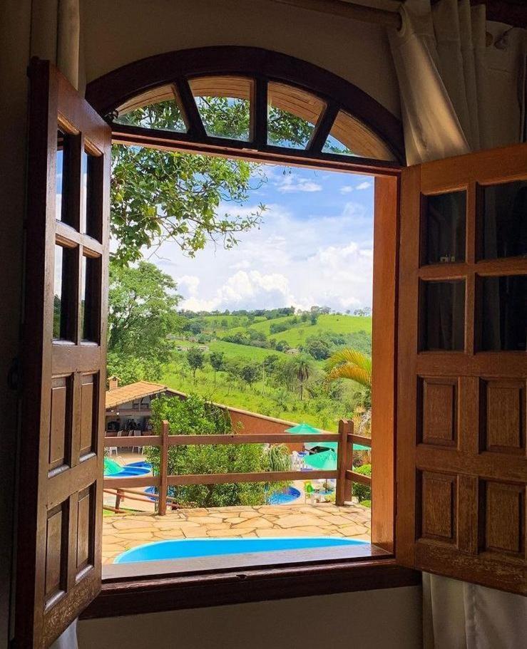 Hotel Fazenda Tucano Capim Branco Bagian luar foto